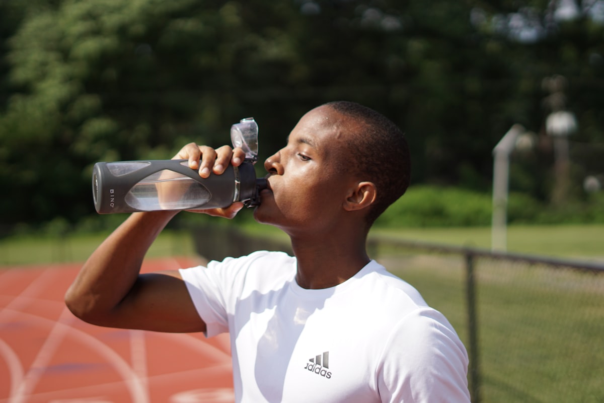Runner hydrating during marathon